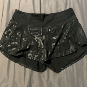 LuLu Lemon Black news print Shorts